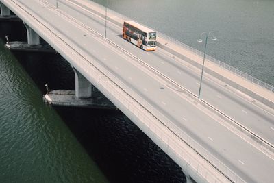 Bus on bridge over the river