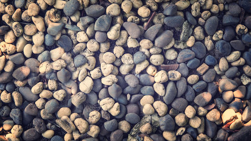 Full frame shot of pebbles on beach