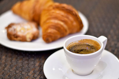 Close-up of coffee served on table