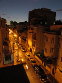 High angle view of illuminated city at night