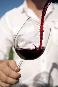 Close-up of hand holding ice cream