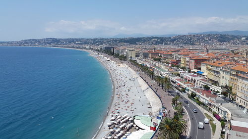 High angle view of city by sea