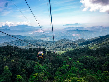 High angle view of overhead cable car against sky