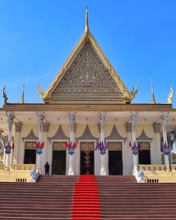 Low angle view of temple against clear blue sky