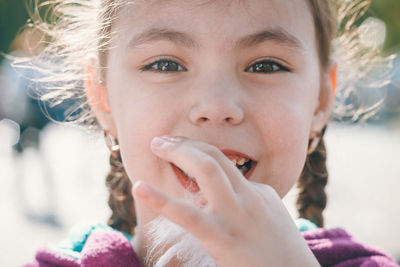 Close-up portrait of innocent girl