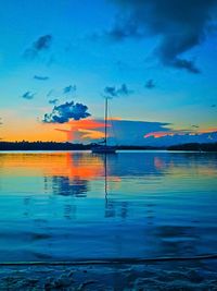 Scenic view of sea against sky at dusk