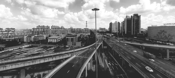 High angle view of street amidst buildings in city