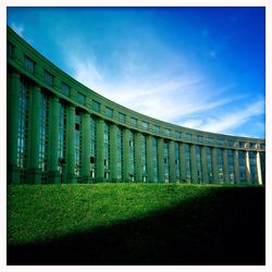 Built structure against blue sky and clouds