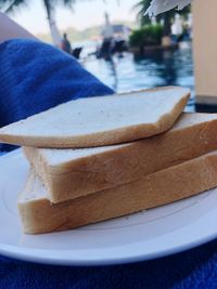 Close-up of bread in plate on table