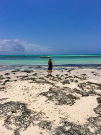 Happy woman on the mythical pingwe beach