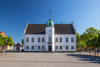 View of building against clear blue sky