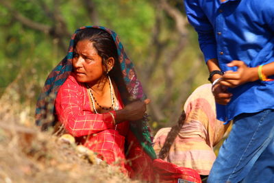 People outdoors in sunny day