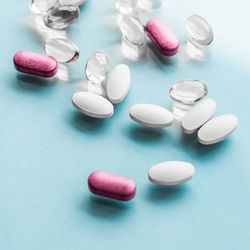 Close-up of pills on blue background