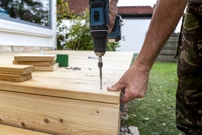 Man working on wood