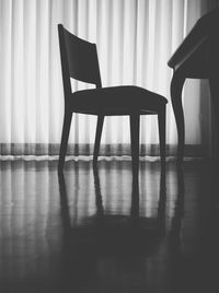 Empty chairs and table at home