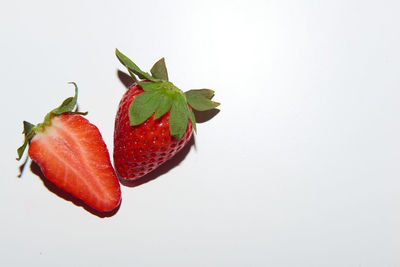 High angle view of strawberry over white background