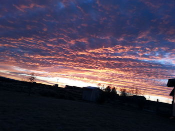 Scenic view of dramatic sky during sunset