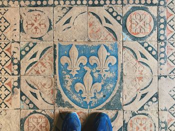 Directly above shot of shoes on floor