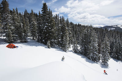 High angle view of man snowboarding on mountain