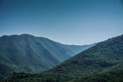 Scenic view of mountains against clear sky