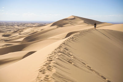 Scenic view of desert against sky