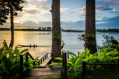 Scenic view of lake against sky during sunset