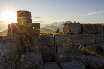 Old ruins against sky during sunset