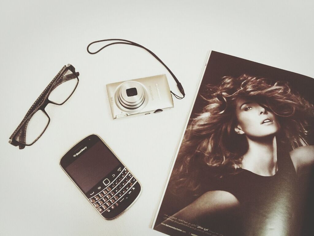 indoors, studio shot, white background, art and craft, art, creativity, wall - building feature, human representation, young adult, communication, front view, still life, technology, close-up, lifestyles, young women