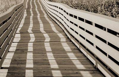 Shadow on empty boardwalk