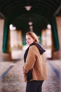 Portrait of woman standing outdoors