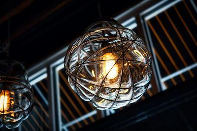 Low angle view of illuminated light bulb