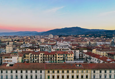 High angle view of townscape against sky during sunset