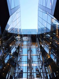 Low angle view of modern buildings against clear sky