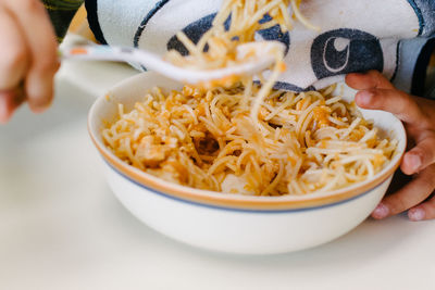 Close-up of woman eating food