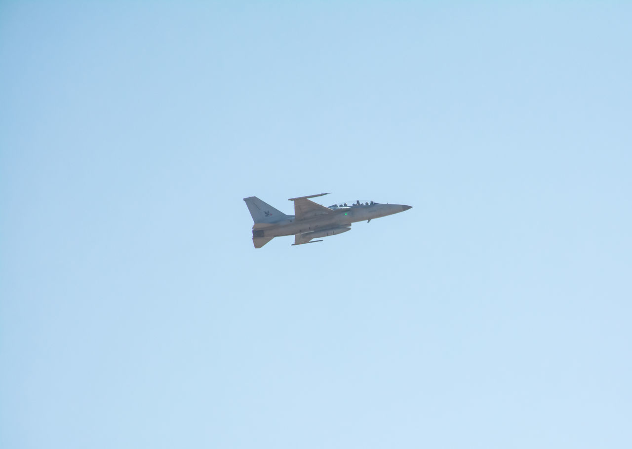 LOW ANGLE VIEW OF AIRPLANE AGAINST CLEAR SKY