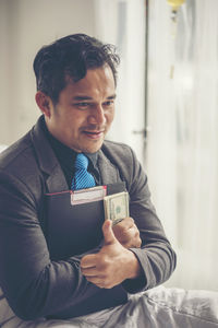 Young man looking at camera