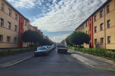 Road with buildings in background