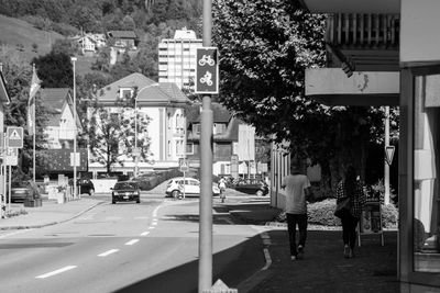 People on street in city