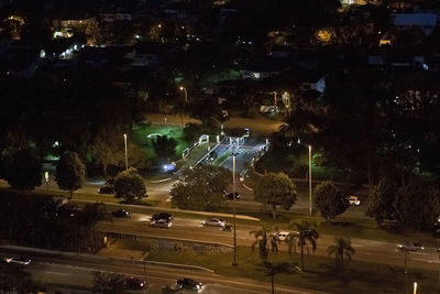 High angle view of illuminated street at night