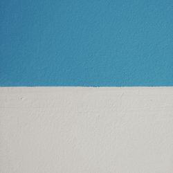 White wall with umbrella