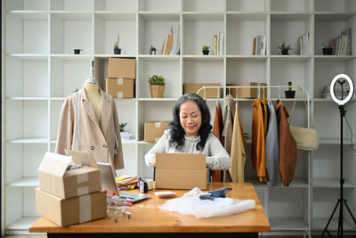 Portrait of woman standing in store