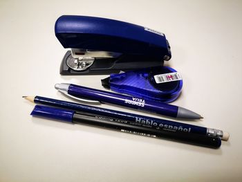 High angle view of pen on table against white background