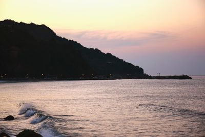 Scenic view of sea at sunset