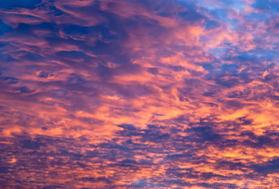 Low angle view of dramatic sky during sunset