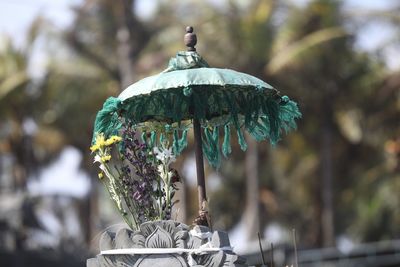 Close-up of statue against trees