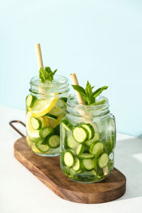 High angle view of drink on table against white background