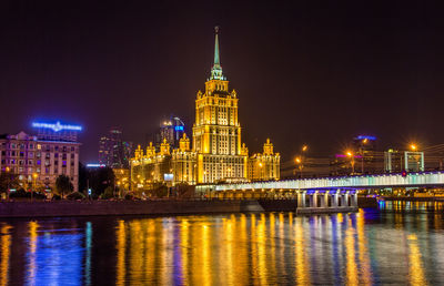 Illuminated buildings in city at night