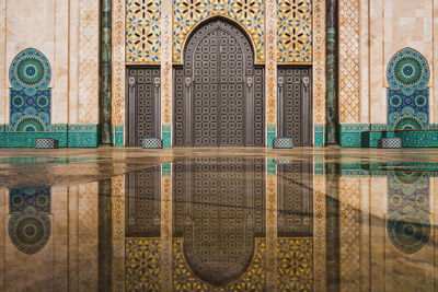 Reflection of historic building on water