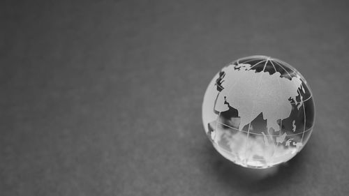 High angle view of glass ball on table