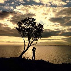 Scenic view of sea at sunset